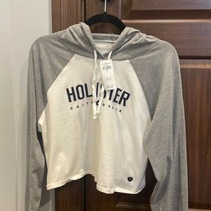Hollister California women’s small cropped long sleeve hooded tee. NWT